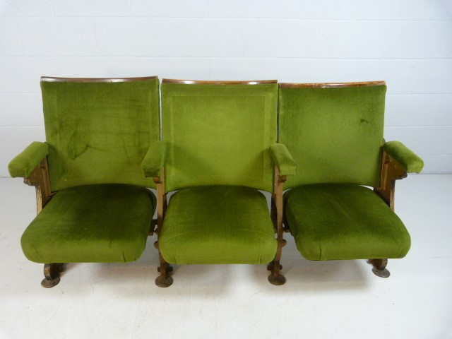 Set of three folding 20th century Cinema theatre seats with cast iron ends and green Velour
