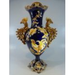 Wilhelm Schiller and Sohn Majolica vase - probably one of two. The twin handles modelled as