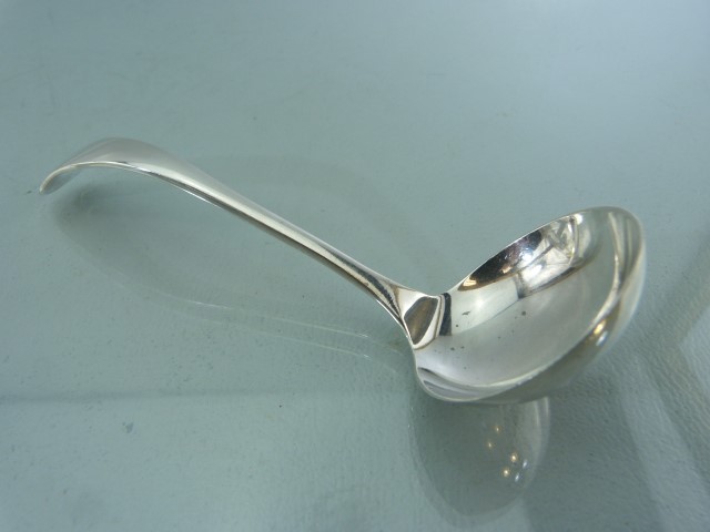 Silver Tongs hallmarked Exeter 1862 and a Silver cream ladle hallmarked Sheffield 1941 - Image 4 of 5