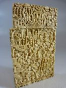 A 19TH CENTURY CHINESE CANTON IVORY CARD CASE, the sides decorated with detailed scenes of