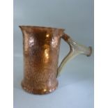 Arts and Crafts copper hammered tankard with Antler handle marked GWG to base.