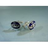 Hallmarked silver cufflinks set with welsh style enamel panels