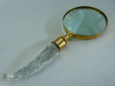 Brass bound and glass handled magnifying glass