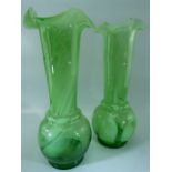 Pair of Glass bulbous bodied and flared neck with wavy rims. Green glass with white glass flecks