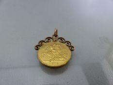 1914 Half Sovereign Coin Pendant, with scroll work and bale soldered to the top on the coin.