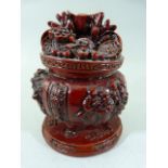 Chinese Trinket Resin pot with lid. Various character marks all over.