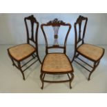 Set of three 19th Century mahogany french chairs with rococo scrolls motif to top and pierced