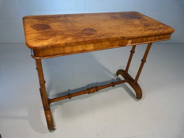 Early 19th Century Mahogany silver table on original china castors