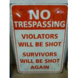 Large metal 'No Trespassing' sign