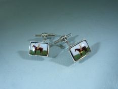 Hallmarked silver Cufflinks set with enamel panel of a horse and rider