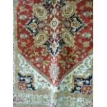 Red ground Heriz rug