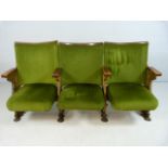 Three Folding 20th century Cinema theatre seats with cast iron ends and green Velour upholstery.