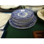 Selection of matching blue and white George Jones 'Abbey' patterned plates of various sizes (13