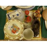 Wedgwood Peter Rabbit children's plate and a Royal Doulton Bunnykins children's plate,