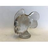 An unusual glass fish ornament, possibly could be used as a car mascot.