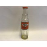 A Vigzol Motor Oil pint bottle.