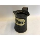 A Ristol pint oil measure with celluloid label.