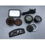 An autojumbler's lot including vintage Smiths clocks, a mirror, light etc.