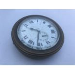 An eight day brass car clock with secondary dial.