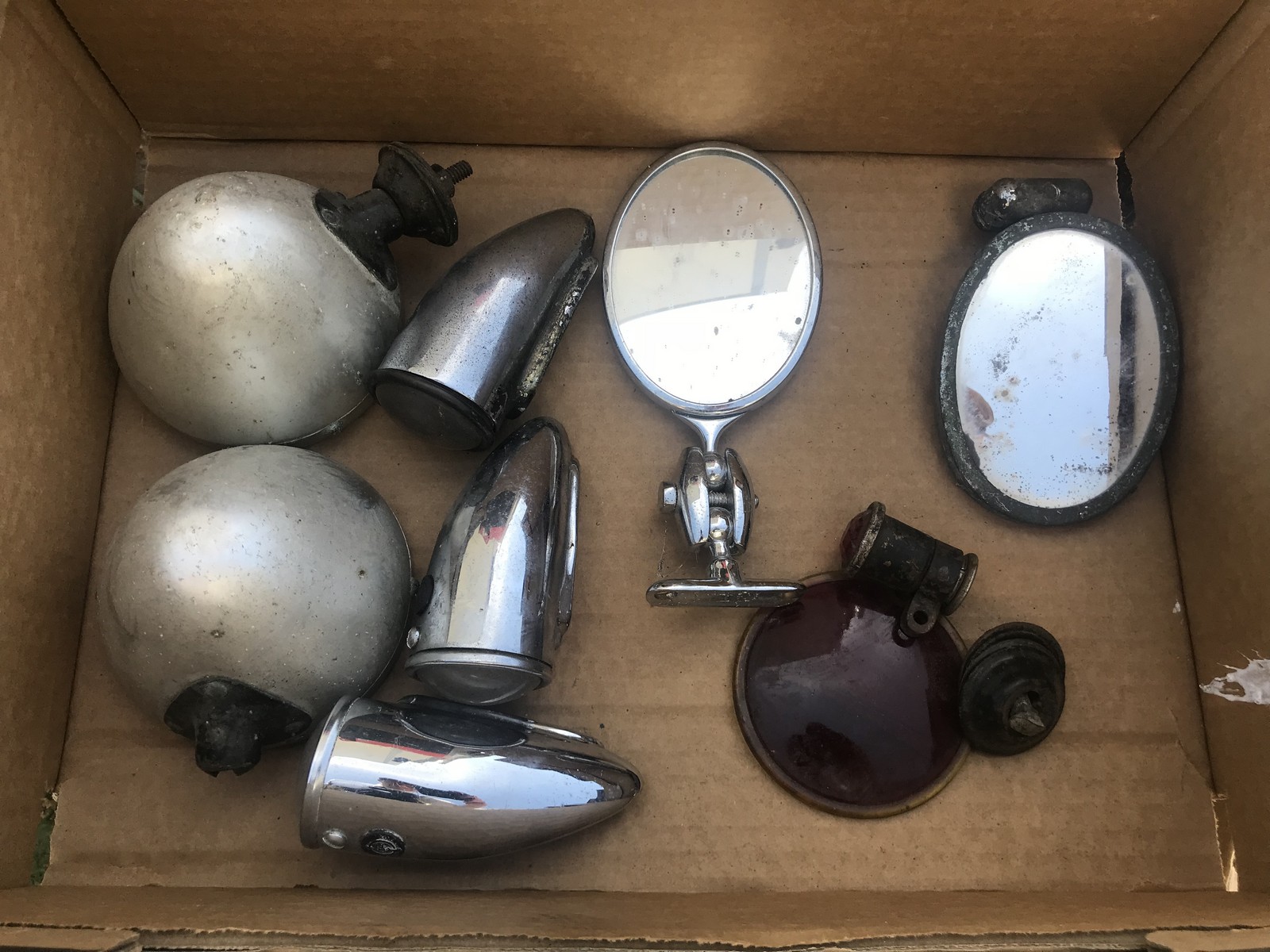 A Desmo oval rear view exterior mirror, one other and various lamps etc.