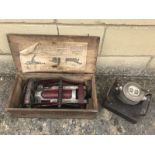 A boxed Wood Milne footpump and a brake test meter.