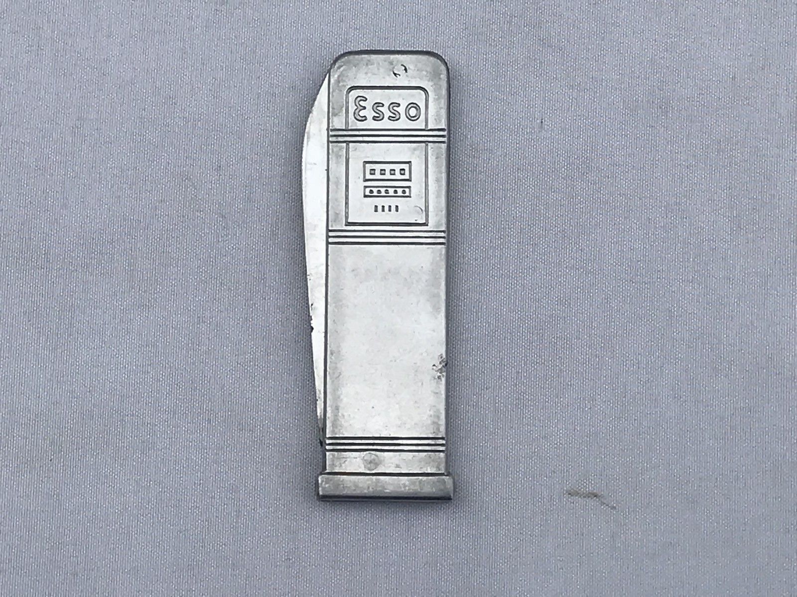 An Esso penknife in the form of a petrol pump, circa 1960s.