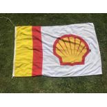 A Shell garage forecourt flag, 73 1/2 x 46 1/2".