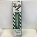 A Duckham's Adcoids Black and White enamel thermometer, in very good condition, 11 x 45 1/4".