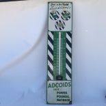 A Duckham's Adcoids black and white enamel thermometer, 11 x 45 1/4".