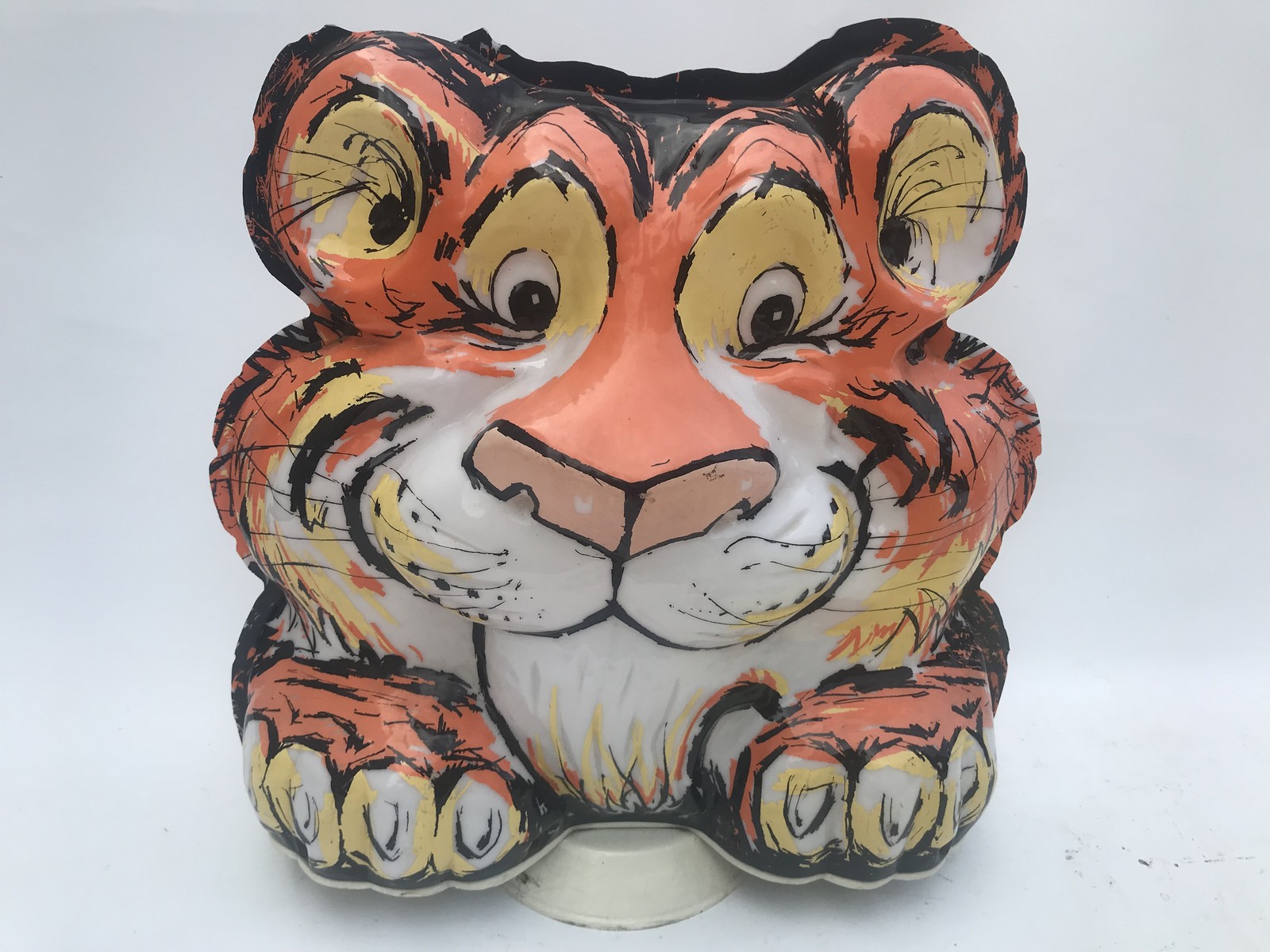 A rare Esso 'Put a tiger in the tank' plastic petrol pump globe, with some damage.