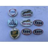 A small selection of petrol related lapel badges.