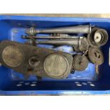 A box of assorted parts including a dashboard, horns etc.