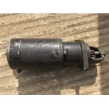 A Lucas starter motor.