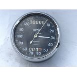 A Smiths 0-120mph black faced chronometric speedometer, appears unused.