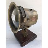 A Rotax Motor Company of London brass lamp no. 884, display base mounted.