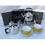 A very good quality Christopher Dresser design silver plated picnic set.