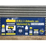A Duckhams Motor Oil advertising sign - 'RNLI Lifeboats are Lubricated by Duckhams', 54 x 22".