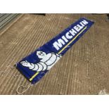 A contemporary Michelin plastic banner, 114 x 18 1/2".