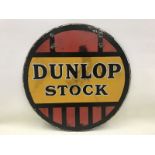 A Dunlop Stock circular double sided enamel sign, 18" diameter.