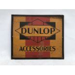 A Dunlop Accessories rectangular tin sign.