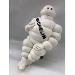 A Michelin Mr Bibendum, with base, stamped Made in France.