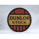 A Dunlop Stock circular double sided enamel sign, 24" diameter.