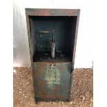 A forecourt oil cabinet.