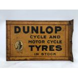 An early Dunlop Cycle and Motor Cycle Tyres double sided tin advertising sign of good colour with