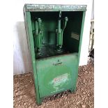 A large Castrol oil cabinet.