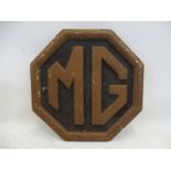 An MG octagonal plaster showroom plaque, 14 1/2 x 14 1/2".