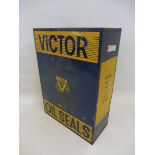 A Victor Oil Seals counter top dispensing shelf, 15 1/4" wide x 21" high x 7" deep.