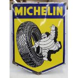 A very large Michelin enamel sign with image of Mr. Bibendum rolling a tyre to the centre, 36 x