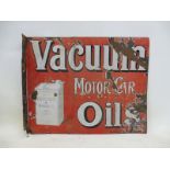 A Vacuum Motor Car Oils part pictorial double sided enamel sign with hanging flange, with can