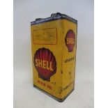 A Shell Motor Oil gallon can.